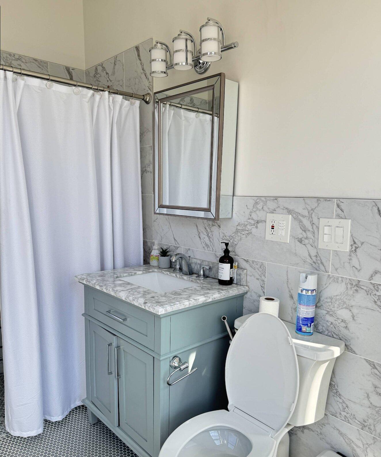 Spa bathroom with marble tile